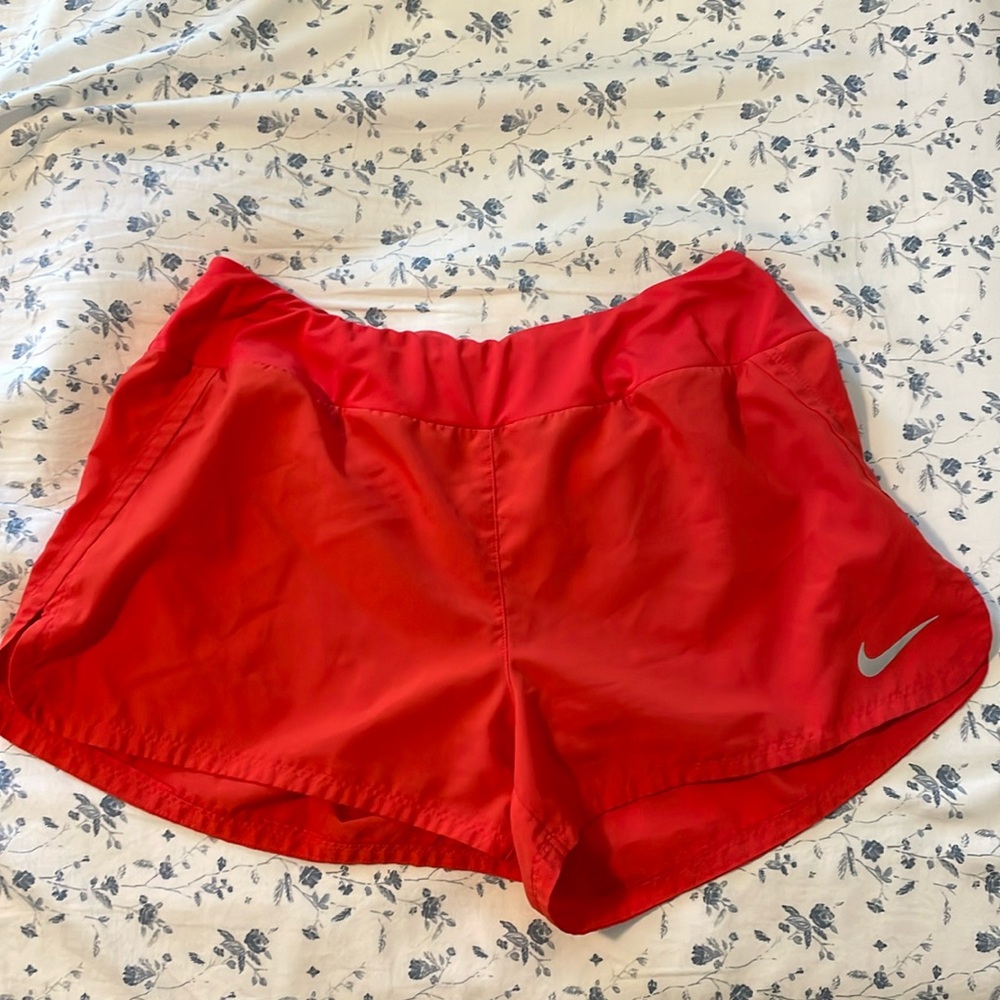 Red Nike shorts